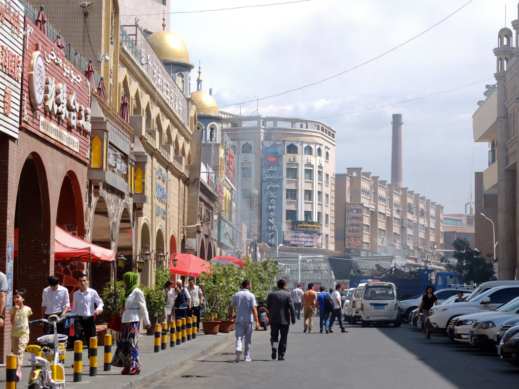 Near the Grand Bazaar, Urumqi, Xinjian Province: You would never guess this photo is taken in China. There are streets in Urumqi where there is more Arabic and Cyrillic alphabet than Chinese characters. As the biggest city for 1000s of kilometers around, Urumqi is an important city in Central Asia.